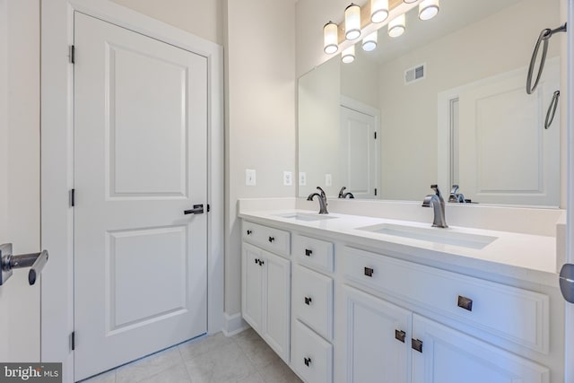 15634 Calum Ct, Haymarket, VA 20169 - bathroom with double vanity and tile patterned flooring