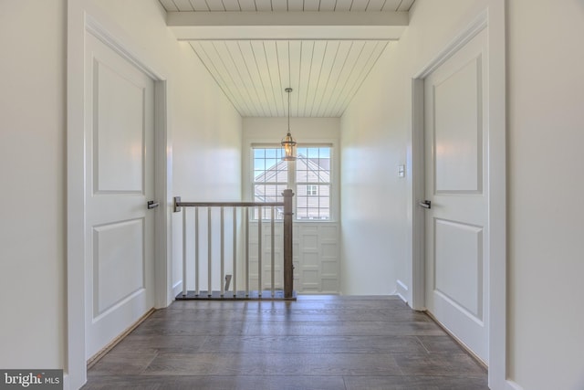 15634 Calum Ct, Haymarket, VA 20169 - corridor featuring dark wood-style flooring and wood ceiling with exposed beams
