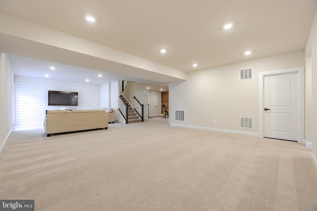 15634 Calum Ct, Haymarket, VA 20169 - finished basement featuring light carpet, stairway, baseboards, and recessed lighting