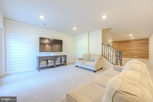 15634 Calum Ct, Haymarket, VA 20169 - carpeted living area featuring wooden walls, stairway, and recessed lighting