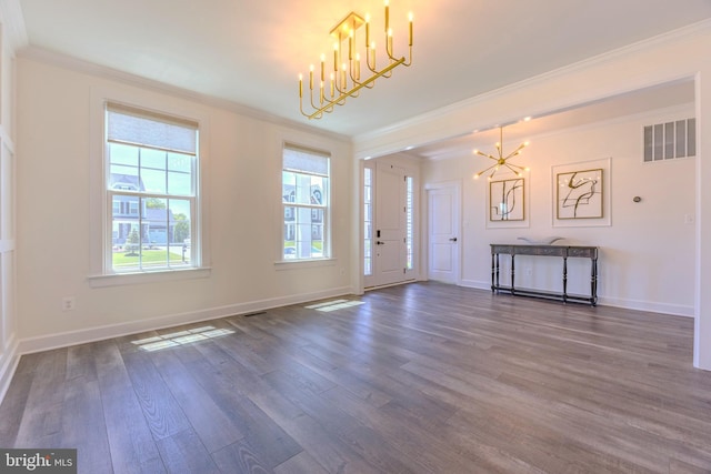 15634 Calum Ct, Haymarket, VA 20169 - entrance foyer featuring a chandelier, ornamental molding, healthy amount of natural light, and wood finished floors