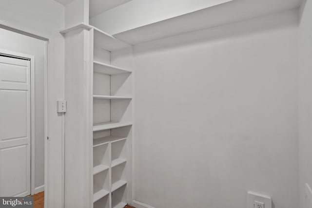 1801 Clydesdale Pl NW Unit 420, Washington, DC 20009 - walk in closet with wood finished floors