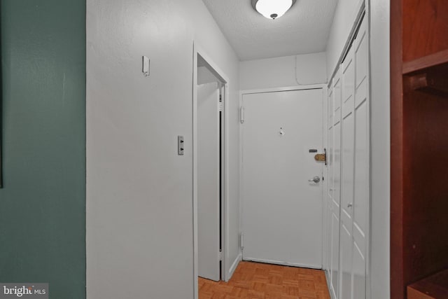 1801 Clydesdale Pl NW Unit 420, Washington, DC 20009 - corridor with a textured ceiling