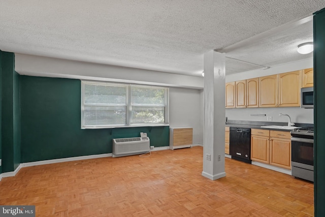 1801 Clydesdale Pl NW Unit 420, Washington, DC 20009 - kitchen featuring appliances with stainless steel finishes, a sink, light brown cabinetry, a textured ceiling, and baseboards