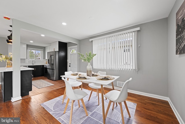 3408 Croydon Rd, Gwynn Oak, MD 21207 - dining area featuring baseboards, wood finished floors, and recessed lighting