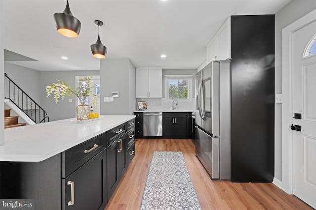 3408 Croydon Rd, Gwynn Oak, MD 21207 - kitchen featuring appliances with stainless steel finishes, dark cabinetry, white cabinetry, light countertops, and recessed lighting