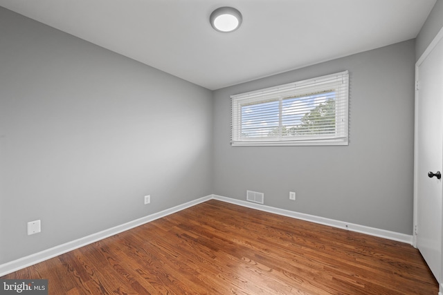 3408 Croydon Rd, Gwynn Oak, MD 21207 - spare room with baseboards and wood finished floors