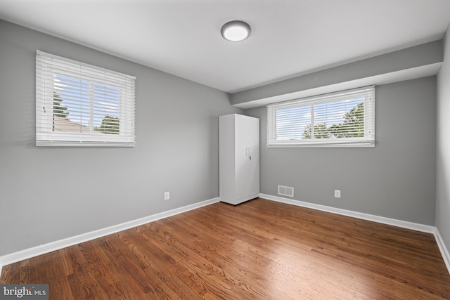 3408 Croydon Rd, Gwynn Oak, MD 21207 - unfurnished bedroom with baseboards and wood finished floors