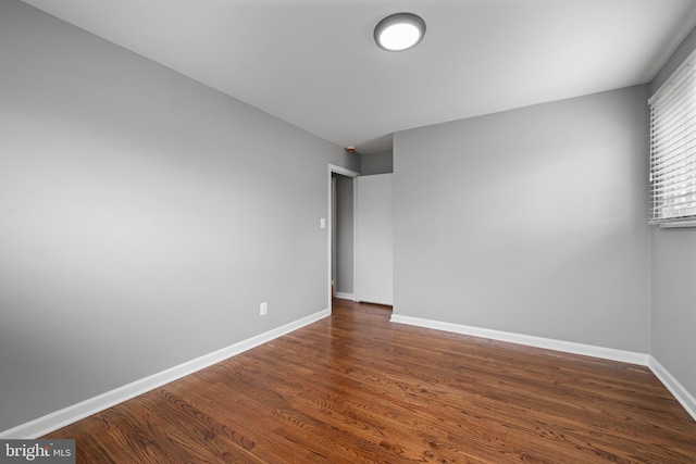 3408 Croydon Rd, Gwynn Oak, MD 21207 - spare room featuring dark wood finished floors and baseboards