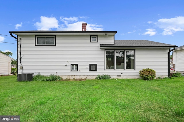 3408 Croydon Rd, Gwynn Oak, MD 21207 - rear view of property featuring a chimney, central air condition unit, and a yard