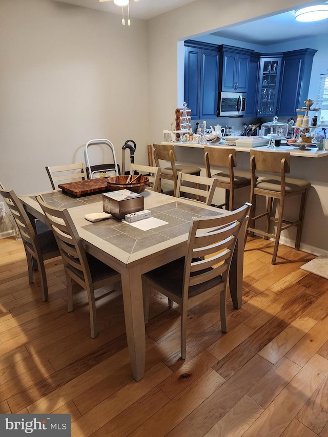 37484 Pettinaro Dr Unit 8300, Ocean View, DE 19970 - dining area with light wood finished floors
