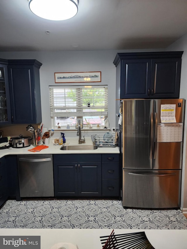 37484 Pettinaro Dr Unit 8300, Ocean View, DE 19970 - kitchen featuring stainless steel appliances, a sink, and light countertops