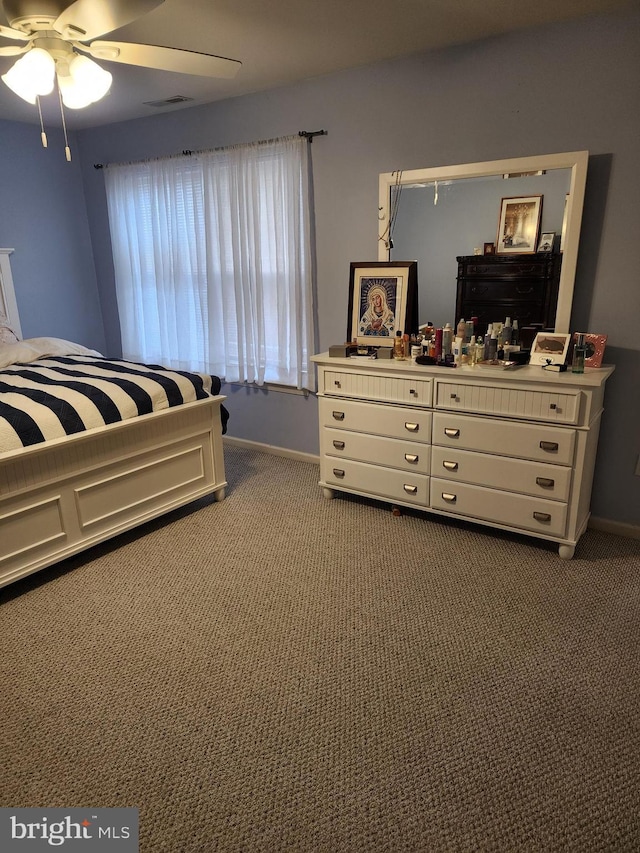 37484 Pettinaro Dr Unit 8300, Ocean View, DE 19970 - bedroom with dark carpet, baseboards, and a ceiling fan