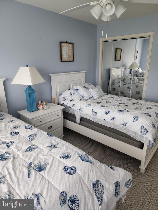 37484 Pettinaro Dr Unit 8300, Ocean View, DE 19970 - bedroom featuring carpet, a closet, and a ceiling fan