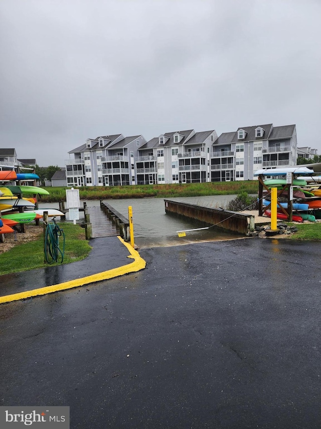 37484 Pettinaro Dr Unit 8300, Ocean View, DE 19970 - view of parking with a boat ramp and a residential view