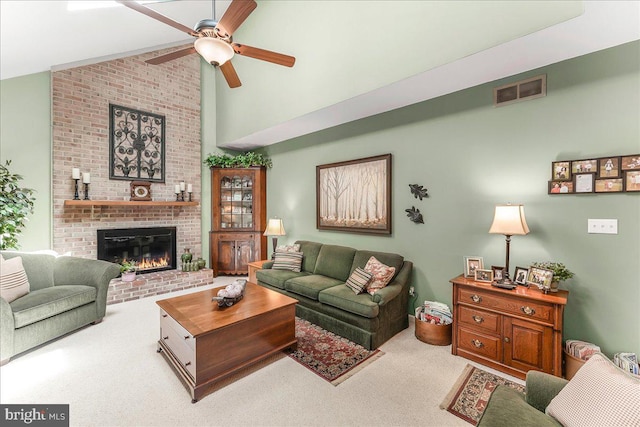 614 Timber Wood Blvd, Newark, DE 19702 - carpeted living room with ceiling fan, a brick fireplace, and high vaulted ceiling