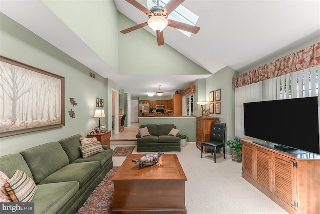 614 Timber Wood Blvd, Newark, DE 19702 - carpeted living area with high vaulted ceiling, a ceiling fan, and a skylight