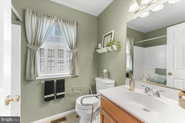 614 Timber Wood Blvd, Newark, DE 19702 - full bathroom featuring toilet, vanity, a shower, tile patterned flooring, and baseboards