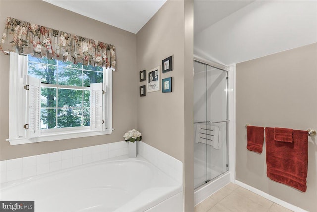 614 Timber Wood Blvd, Newark, DE 19702 - bathroom with a bath, a shower stall, plenty of natural light, and tile patterned floors