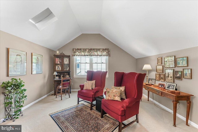 614 Timber Wood Blvd, Newark, DE 19702 - living area with carpet flooring, baseboards, vaulted ceiling, and a skylight
