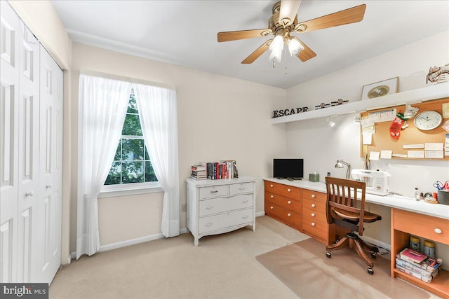 614 Timber Wood Blvd, Newark, DE 19702 - office space featuring a ceiling fan, light colored carpet, built in desk, and baseboards