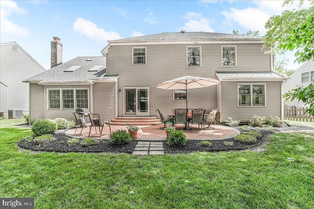 614 Timber Wood Blvd, Newark, DE 19702 - back of house featuring a patio area, a lawn, and central AC unit