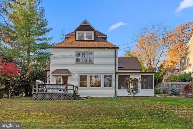12 Chestnut Ln, Wayne, PA 19087 - back of house featuring a deck, a sunroom, and a shingled roof