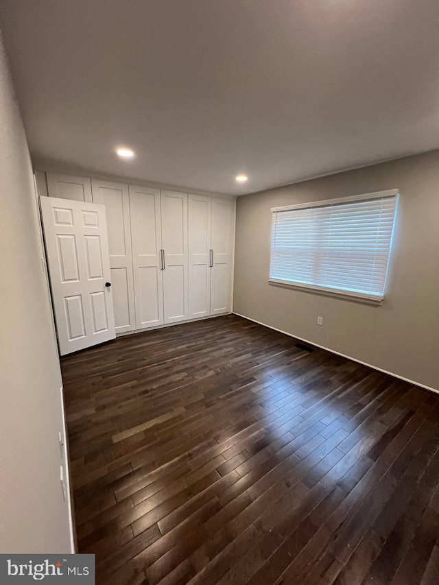 19 Wolf Trap, Baltimore, MD 21236 - unfurnished bedroom with dark wood-type flooring and recessed lighting
