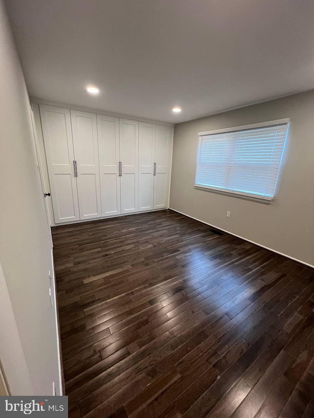 19 Wolf Trap, Baltimore, MD 21236 - unfurnished bedroom featuring dark wood finished floors and recessed lighting