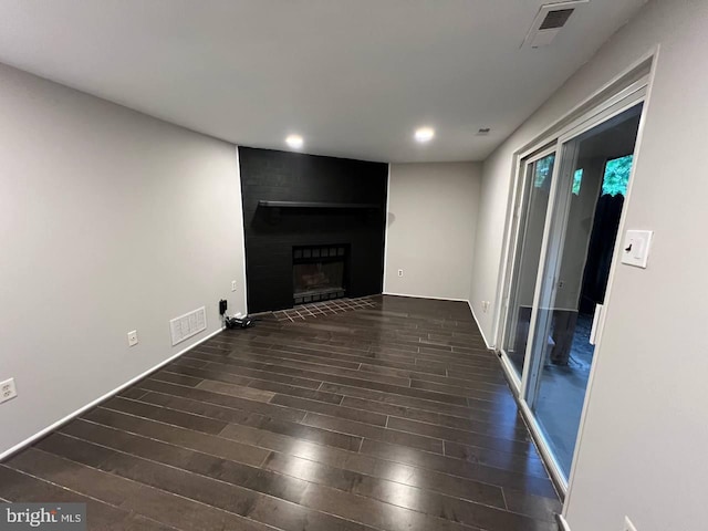 19 Wolf Trap, Baltimore, MD 21236 - unfurnished living room featuring wood finished floors, a brick fireplace, and recessed lighting