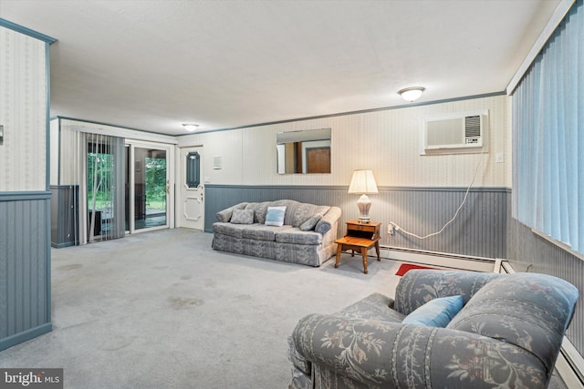 711 Pikeland Ave, Spring City, PA 19475 - carpeted living room with a wall mounted AC, a baseboard radiator, wainscoting, and wallpapered walls