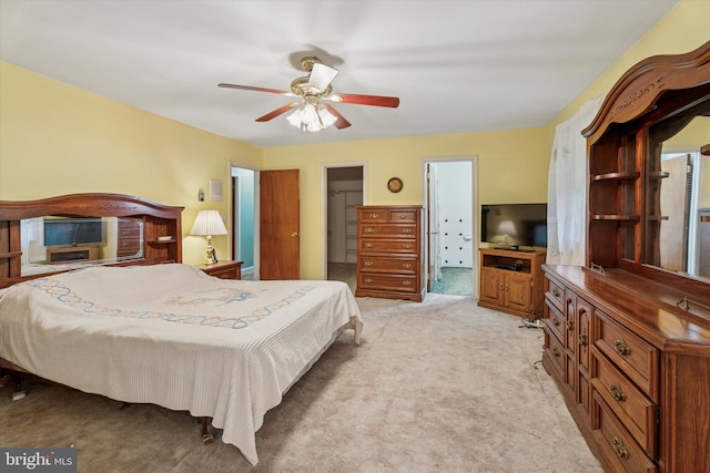 711 Pikeland Ave, Spring City, PA 19475 - bedroom featuring light carpet, a spacious closet, ceiling fan, and a closet