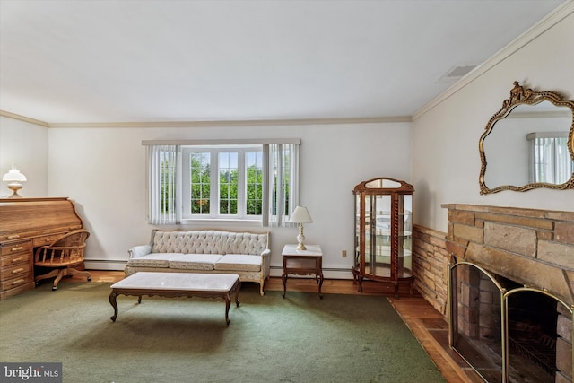 711 Pikeland Ave, Spring City, PA 19475 - living area featuring ornamental molding, a fireplace, and a baseboard heating unit