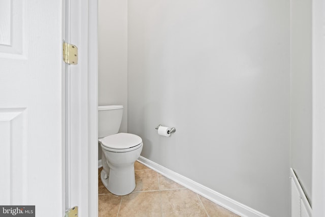 10000 Umbrella Pl, Nokesville, VA 20181 - bathroom with tile patterned floors, toilet, and baseboards