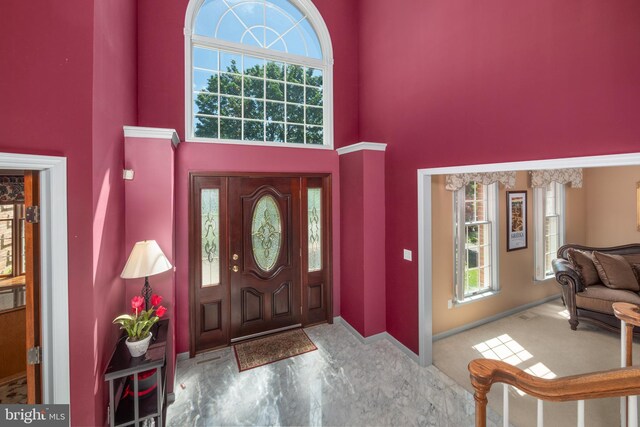 1224 Highland Dr, Orefield, PA 18069 - entrance foyer with a towering ceiling, baseboards, and marble finish floors