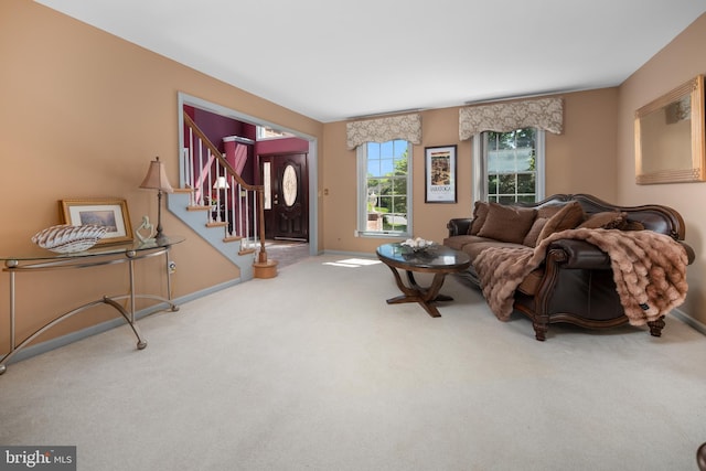 1224 Highland Dr, Orefield, PA 18069 - living area with carpet floors, baseboards, and stairway