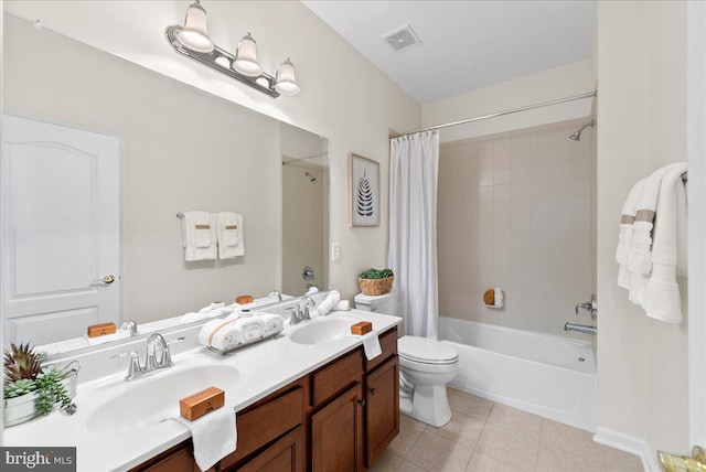 44324 Stableford Sq, Ashburn, VA 20147 - full bathroom featuring double vanity, shower / bath combination with curtain, toilet, and tile patterned flooring