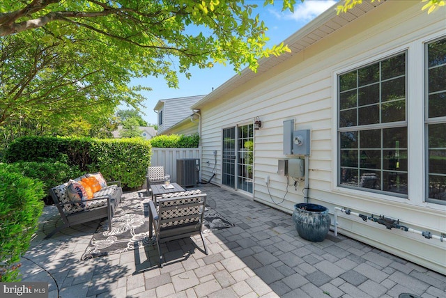 44324 Stableford Sq, Ashburn, VA 20147 - view of patio / terrace featuring an outdoor living space and cooling unit