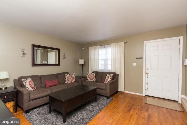 41 Luffing Ct, Baltimore, MD 21221 - living area featuring wood finished floors and baseboards