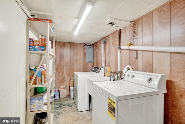 827 Pennsylvania Ave, York, PA 17404 - washroom with independent washer and dryer, electric panel, and wooden walls
