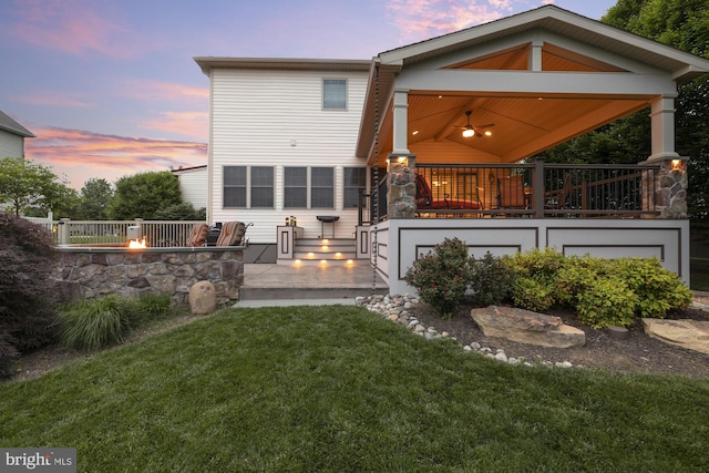 6133 Jennifer Ln, Spring Grove, PA 17362 - rear view of house featuring a fire pit and a lawn