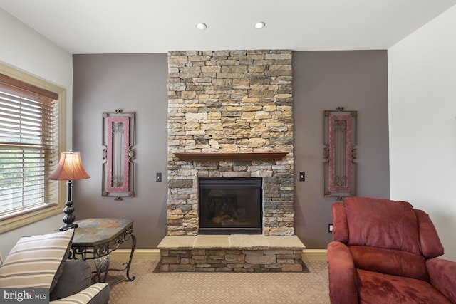 6133 Jennifer Ln, Spring Grove, PA 17362 - living room with carpet floors, a stone fireplace, baseboards, and recessed lighting