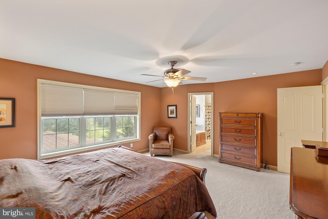 6133 Jennifer Ln, Spring Grove, PA 17362 - bedroom featuring light colored carpet, baseboards, a ceiling fan, and ensuite bathroom