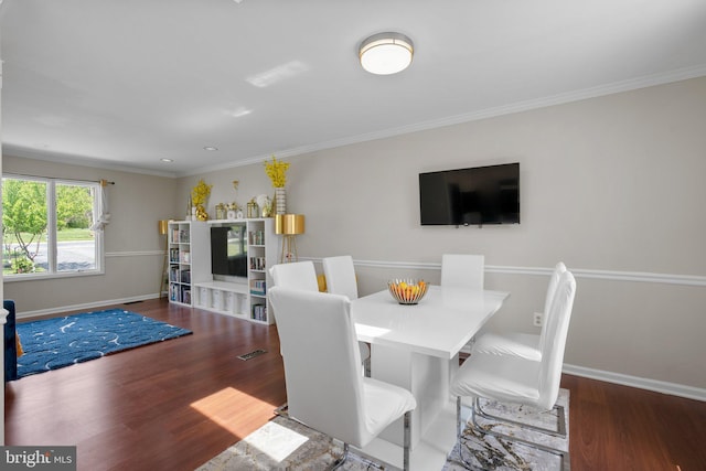 10100 Lewis Dr, Damascus, MD 20872 - dining room with wood finished floors, ornamental molding, and baseboards