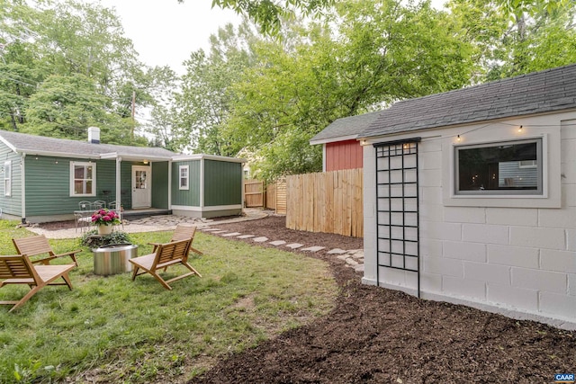 304 NW 11th St, Charlottesville, VA 22903 - view of yard featuring an outdoor structure and view of scattered trees
