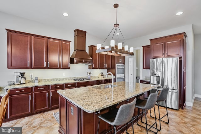 18604 Wild Raspberry Dr, Purcellville, VA 20132 - kitchen with stainless steel appliances, a sink, custom exhaust hood, reddish brown cabinets, and recessed lighting