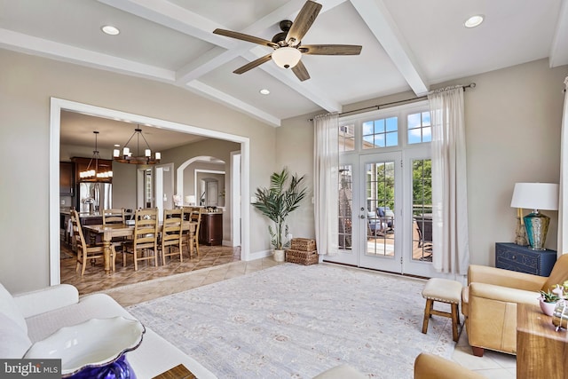 18604 Wild Raspberry Dr, Purcellville, VA 20132 - living area featuring arched walkways, a chandelier, ceiling fan, french doors, and tile patterned flooring