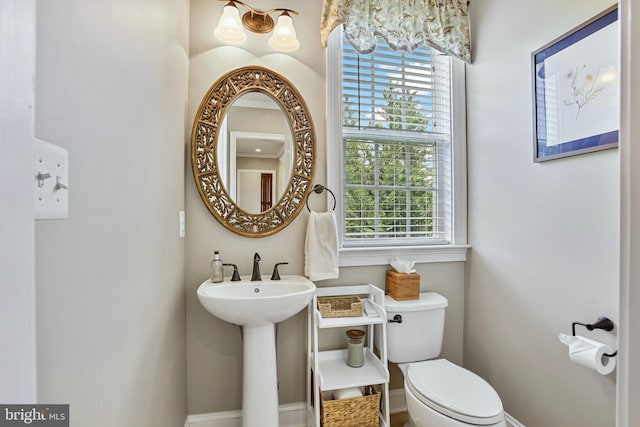 18604 Wild Raspberry Dr, Purcellville, VA 20132 - bathroom featuring toilet and baseboards