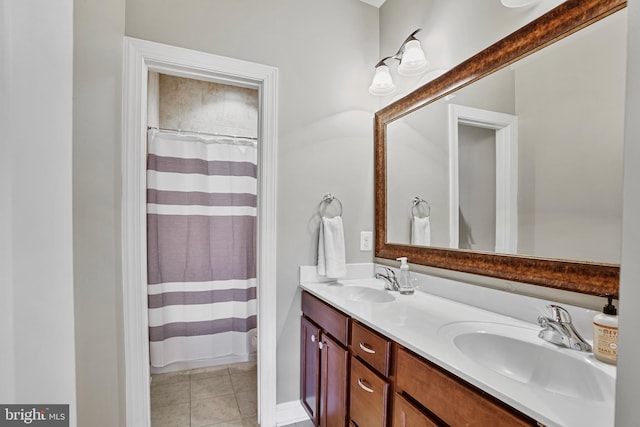 18604 Wild Raspberry Dr, Purcellville, VA 20132 - bathroom with double vanity, tile patterned flooring, and curtained shower