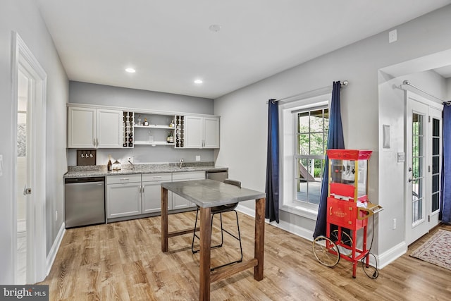 18604 Wild Raspberry Dr, Purcellville, VA 20132 - kitchen featuring dishwashing machine, light wood-style floors, open shelves, baseboards, and recessed lighting